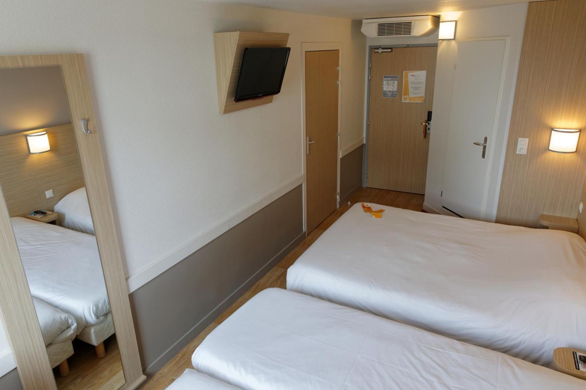 พรีเมียรคลาสลีออนซุดปิแอร์เบไนท์ Hotel Irigny ภายนอก รูปภาพ